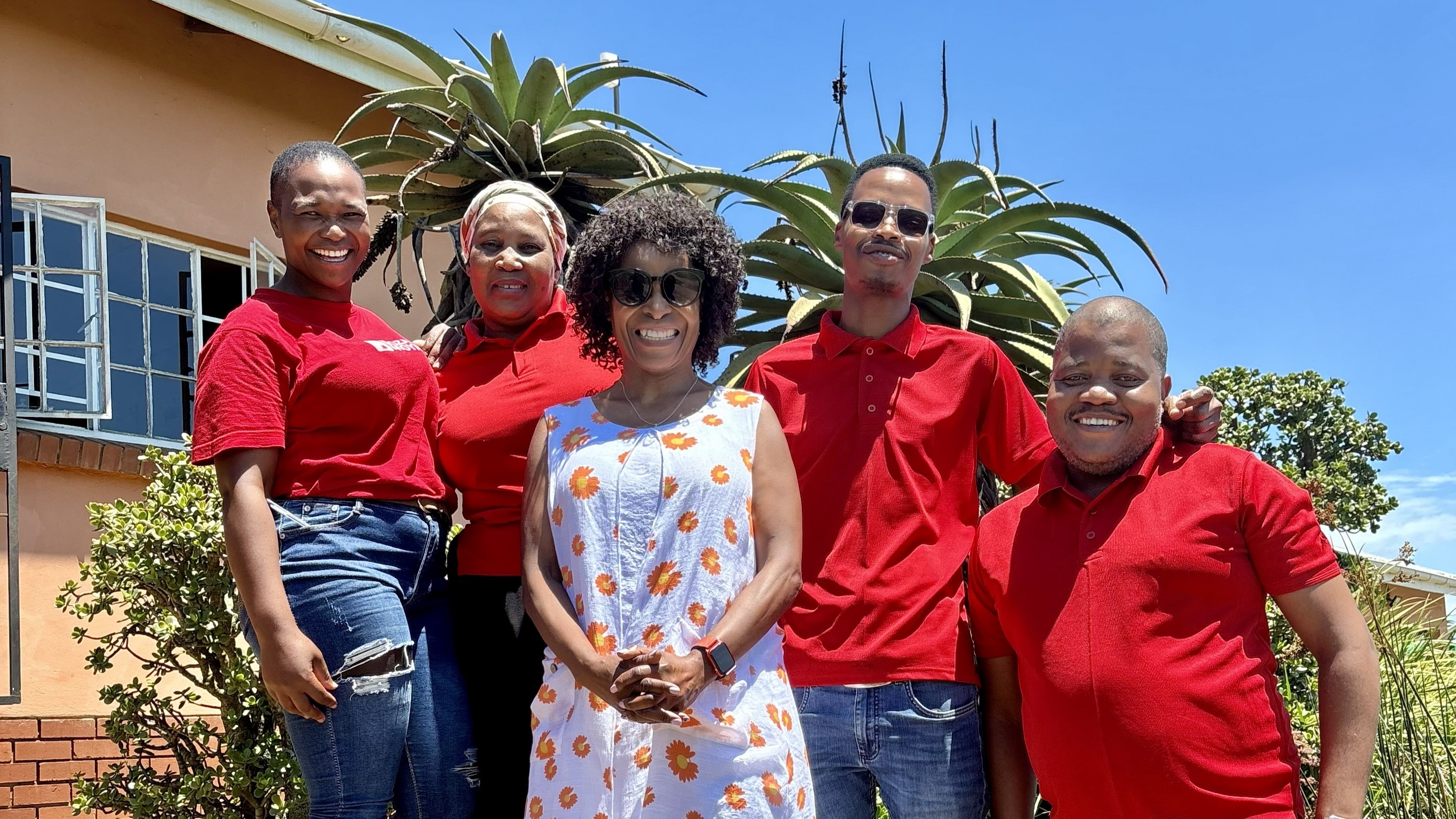 
                         Community & Partnerships                                                    - 
                          Dr. Nomusa Mngoma (Family Medicine) with staff at the Woza Moya Community Centre, Ixopo, South Africa.                                                    